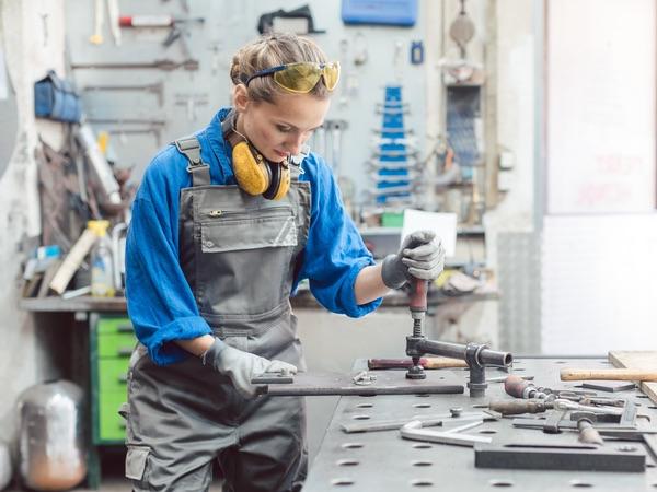 Woman using Machining Technology